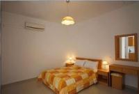 Postel nebo postele na pokoji v ubytování Fotini Apartments
