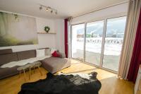 Łóżko lub łóżka w pokoju w obiekcie Finest Kitzblick Golf Suites by All in One Apartments