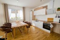 Kuchnia lub aneks kuchenny w obiekcie Finest Kitzblick Golf Suites by All in One Apartments