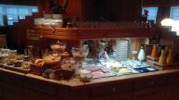 a buffet of food on a counter in a room at Gasthof Panorama in Obsteig