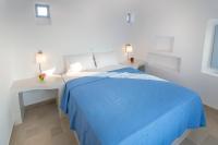 Posteľ alebo postele v izbe v ubytovaní Passos Villas