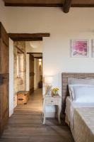 A bed or beds in a room at La Casa di Alice