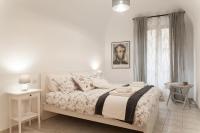 Posteľ alebo postele v izbe v ubytovaní Ricciarelli Home