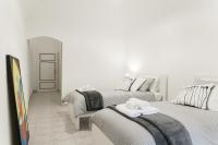 Posteľ alebo postele v izbe v ubytovaní Ricciarelli Home