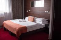 Postel nebo postele na pokoji v ubytování Hotel Slavie