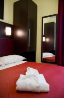 Posteľ alebo postele v izbe v ubytovaní Hotel Alibi