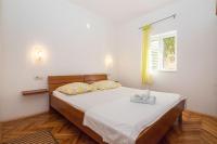 Postel nebo postele na pokoji v ubytování Apartments Antonija