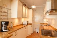 Kuchyň nebo kuchyňský kout v ubytování Carabeo 52 Apartments Casasol