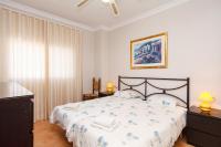 Postel nebo postele na pokoji v ubytování Carabeo 52 Apartments Casasol