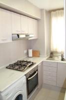 A kitchen or kitchenette at 1ªLinea de playa Puerto de Sagunto