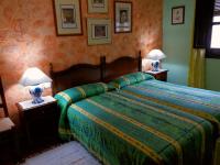 Postel nebo postele na pokoji v ubytování Hotel De Mecina Fondales