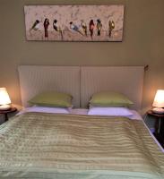 Poste&#x13E; alebo postele v izbe v ubytovan&iacute; La Maison du Parc