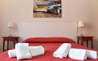 Posteľ alebo postele v izbe v ubytovaní Alta Marea B&B