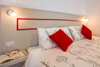 A bed or beds in a room at Jolie Julie Accomodation