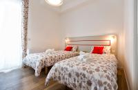 A bed or beds in a room at Jolie Julie Accomodation