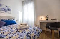 A bed or beds in a room at Jolie Julie Accomodation
