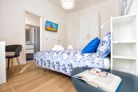 A bed or beds in a room at Jolie Julie Accomodation