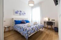 A bed or beds in a room at Jolie Julie Accomodation
