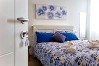 A bed or beds in a room at Jolie Julie Accomodation