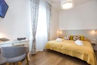 A bed or beds in a room at Jolie Julie Accomodation