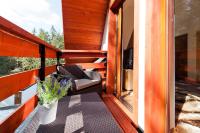 Televízia a/alebo spoločenská miestnosť v ubytovaní Apartamenty Sun & Snow Kościelisko Residence