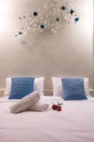Postel nebo postele na pokoji v ubytování Laemsing Whitehouse Resort
