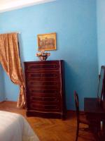 Łóżko lub łóżka w pokoju w obiekcie Napoli Retro