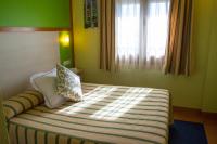 Postel nebo postele na pokoji v ubytování Hospedium Hotel Maestrazgo de Calatrava