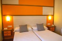 Postel nebo postele na pokoji v ubytování Hospedium Hotel Maestrazgo de Calatrava
