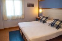 Postel nebo postele na pokoji v ubytování Hospedium Hotel Maestrazgo de Calatrava