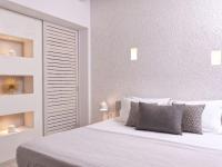 ミスト ブティック ホテルにあるベッド
