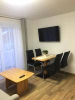 Telewizja i/lub zestaw kina domowego w obiekcie Ferienwohnung Imbach