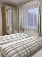 Łóżko lub łóżka w pokoju w obiekcie Ferienwohnung Imbach