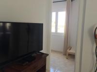 TV a/nebo společenská místnost v ubytování Cozy vacation apartment in Los Gigantes