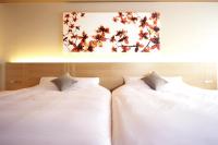 hotel kanra kyotoにあるベッド