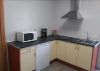 Kuchyň nebo kuchyňský kout v ubytování Zamora Apartments