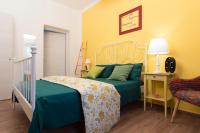 Posteľ alebo postele v izbe v ubytovaní Il Sogno Apartments