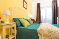 Posteľ alebo postele v izbe v ubytovaní Il Sogno Apartments