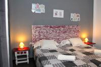 Postel nebo postele na pokoji v ubytování Oasis Backpackers' Toledo