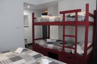 Postel nebo postele na pokoji v ubytování Oasis Backpackers' Toledo