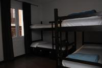 Postel nebo postele na pokoji v ubytování Oasis Backpackers' Toledo