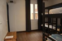 Postel nebo postele na pokoji v ubytování Oasis Backpackers' Toledo