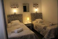 Postel nebo postele na pokoji v ubytování Oasis Backpackers' Toledo