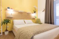 Posteľ alebo postele v izbe v ubytovaní Il Sogno Apartments