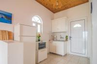 Kuchyň nebo kuchyňský kout v ubytování Porto Giardino Apartments