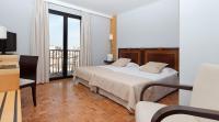 Postel nebo postele na pokoji v ubytování Hotel Don Curro
