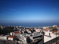 a view of a city with buildings at Maximus Hotel Byblos in Jbeil
