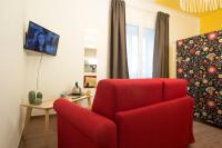 Televízia a/alebo spoločenská miestnosť v ubytovaní Il Sogno Apartments
