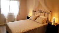 Posteľ alebo postele v izbe v ubytovaní Apartamento DACTONIUM - Ribeira Sacra