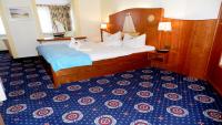 Postel nebo postele na pokoji v ubytování Hotel Deutsche Flagge